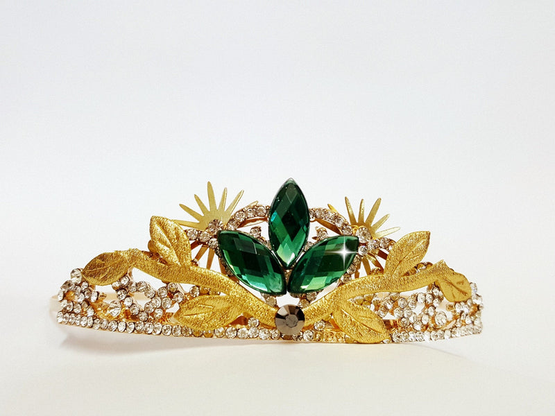 green and gold rhinestone crown